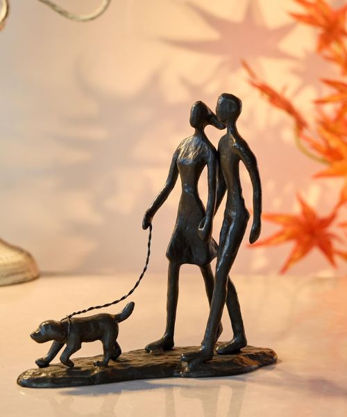 Couple and Dog Cast Iron Sculpture