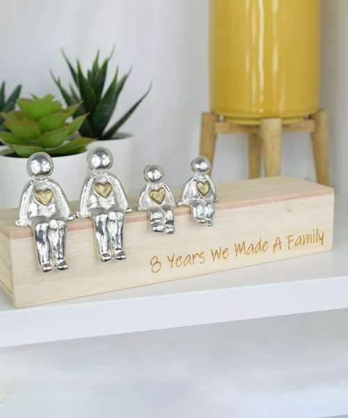 Figurines With Bronze Hearts
