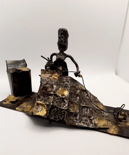 Quilter Metal Sculpture
