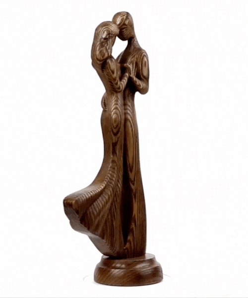 Sculpture Of Kissing Couples